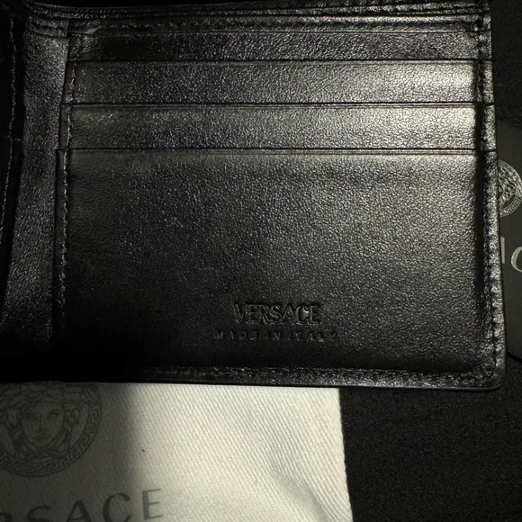 Versace blue multicolor leather La Greca bifold wallet.
